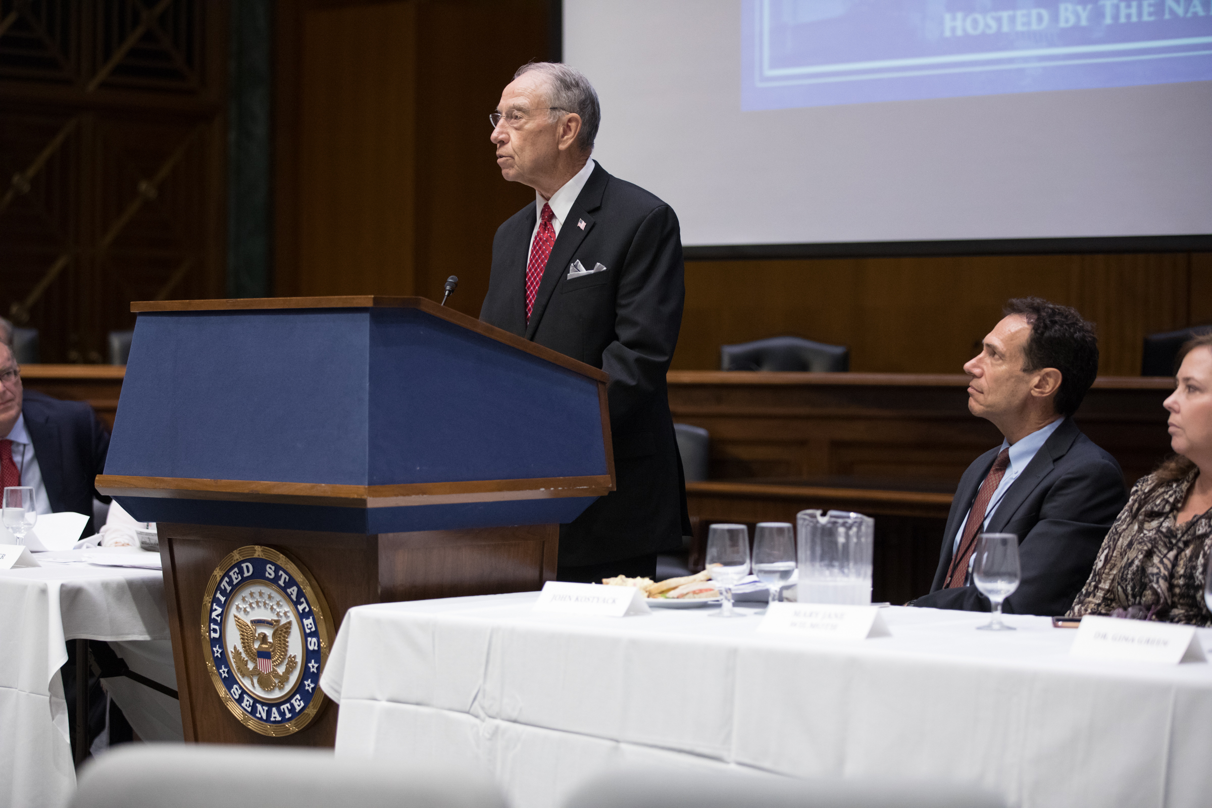Senator Grassley Speaking At Lecturn