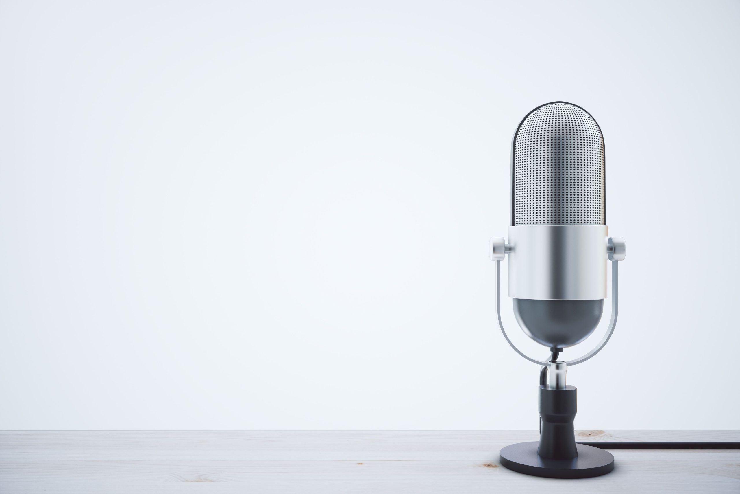 Microphone and chord on table